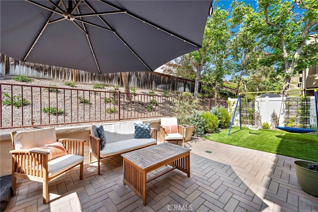 view of patio with a fenced backyard and an outdoor living space