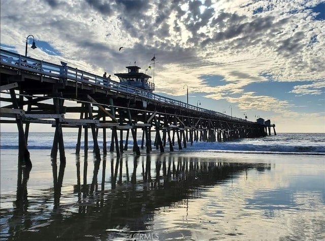 dock area featuring a water view and a pier