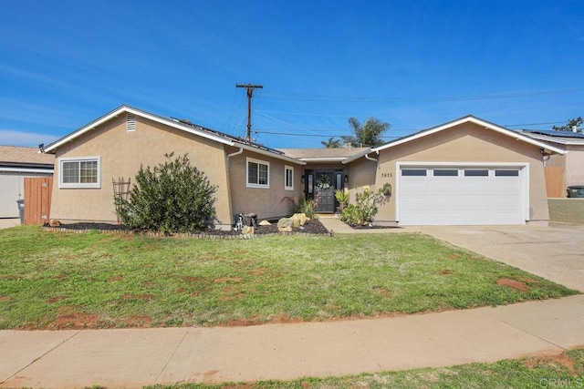 single story home with a garage and a front lawn