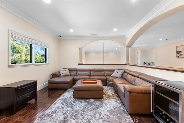 living room featuring ornamental molding and dark wood-type flooring