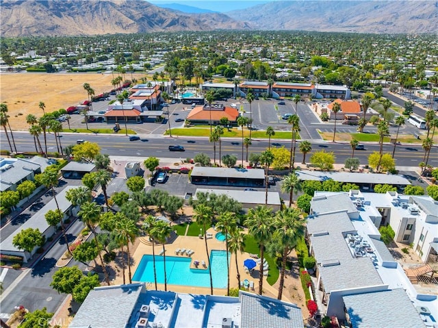 1150 E Palm Canyon Dr Unit 51, Palm Springs, CA 92264 - aerial perspective of suburban area featuring mountains and a pool area