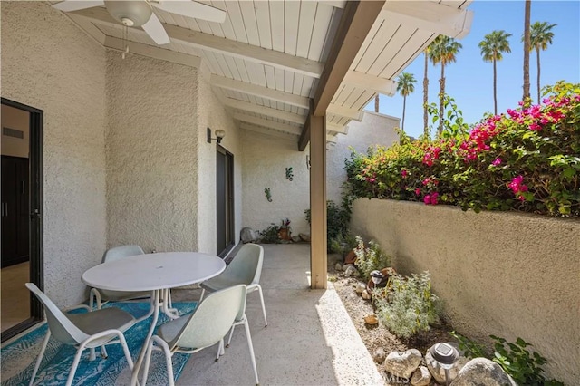 1150 E Palm Canyon Dr Unit 51, Palm Springs, CA 92264 - view of patio / terrace featuring ceiling fan and outdoor dining area