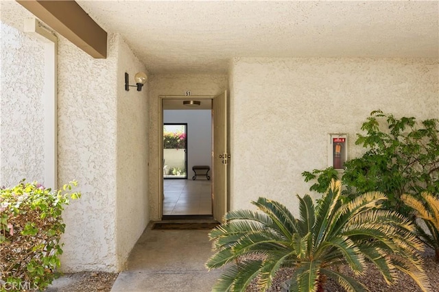 1150 E Palm Canyon Dr Unit 51, Palm Springs, CA 92264 - view of exterior entry with stucco siding