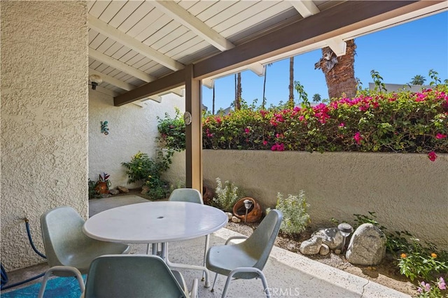 1150 E Palm Canyon Dr Unit 51, Palm Springs, CA 92264 - view of patio / terrace with outdoor dining area