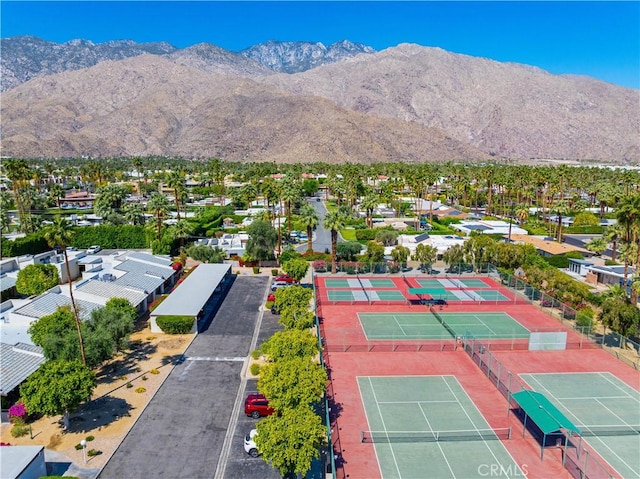 1150 E Palm Canyon Dr Unit 51, Palm Springs, CA 92264 - aerial perspective of suburban area with a mountainous background