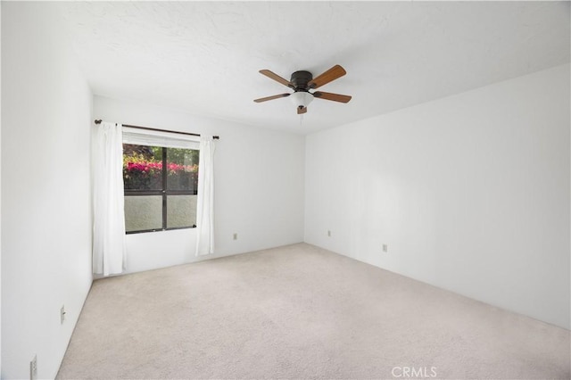 1150 E Palm Canyon Dr Unit 51, Palm Springs, CA 92264 - spare room featuring carpet and a ceiling fan