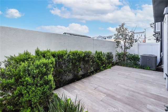 view of patio / terrace featuring central AC unit