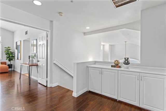 hall featuring dark hardwood / wood-style floors