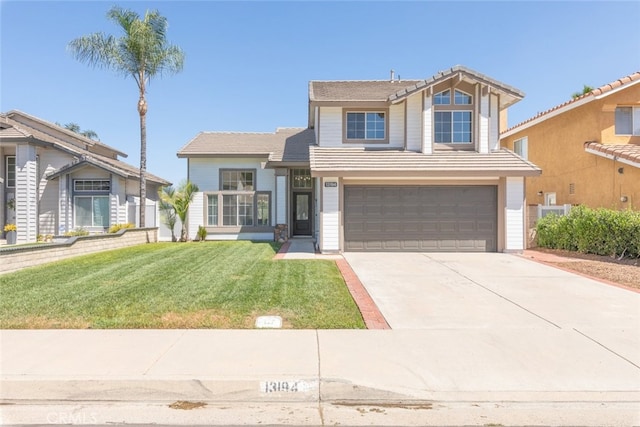 view of front facade featuring a front lawn and a garage