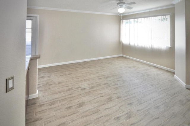 spare room with ceiling fan, ornamental molding, and light hardwood / wood-style floors