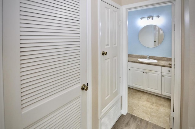 bathroom featuring vanity and tile patterned flooring