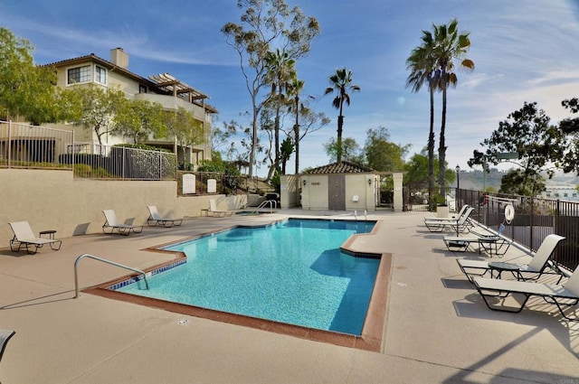 view of pool featuring a patio