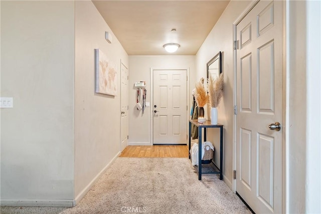 interior space featuring light colored carpet