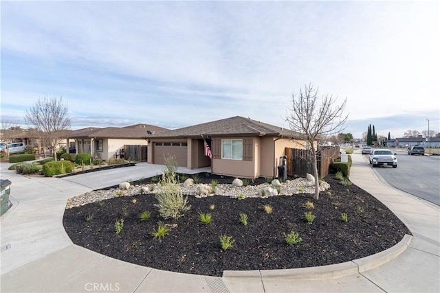 ranch-style home featuring a garage