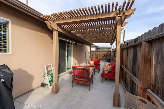 view of patio with outdoor lounge area and a pergola