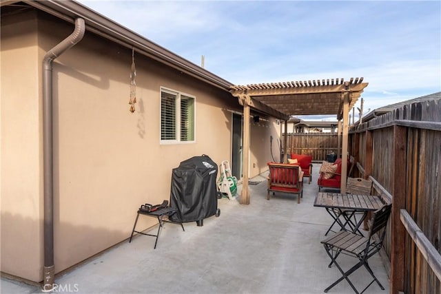 view of patio with an outdoor hangout area and a pergola