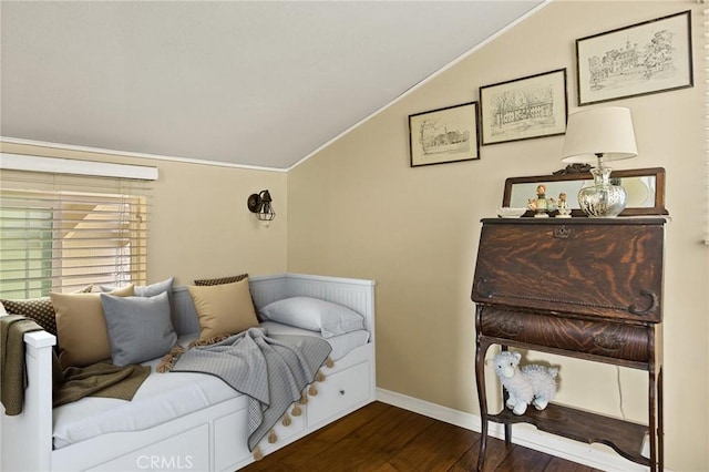 living area with ornamental molding, dark wood-type flooring, and lofted ceiling