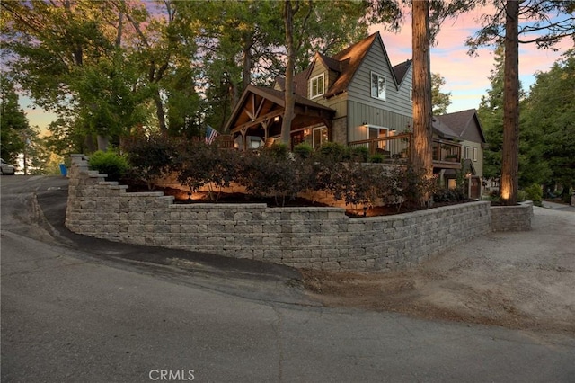 view of property exterior at dusk