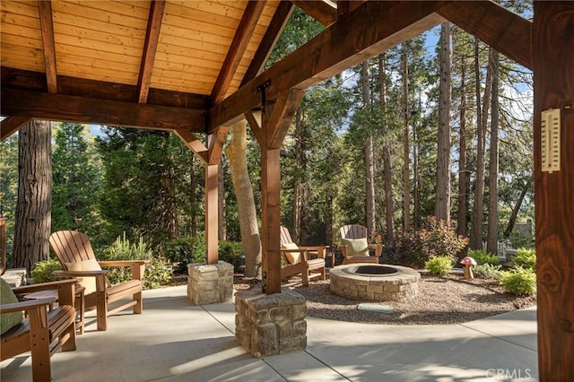 view of patio featuring a gazebo and an outdoor fire pit