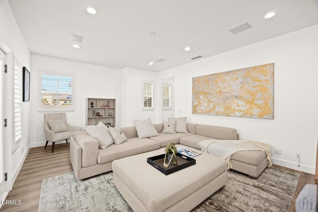 living room featuring light hardwood / wood-style floors