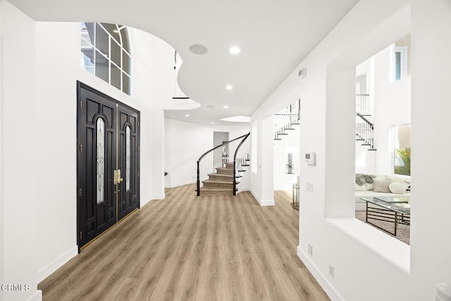 foyer featuring light hardwood / wood-style flooring