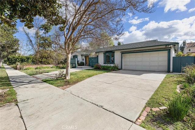 ranch-style home with a garage