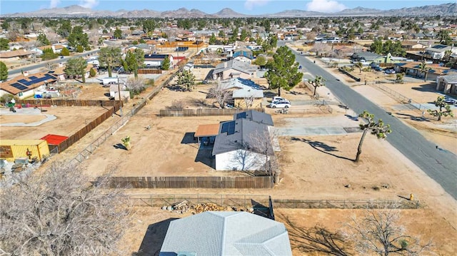 bird's eye view featuring a residential view and a mountain view