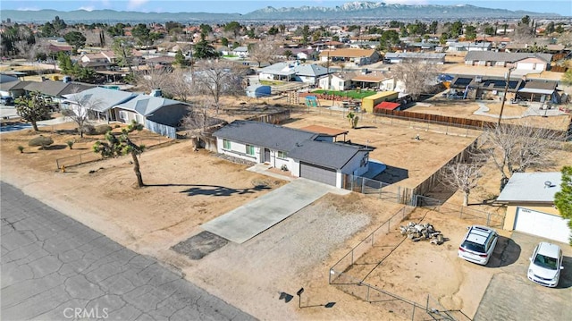 aerial view featuring a residential view and a mountain view