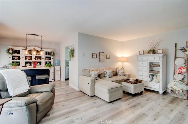 living room with light hardwood / wood-style floors