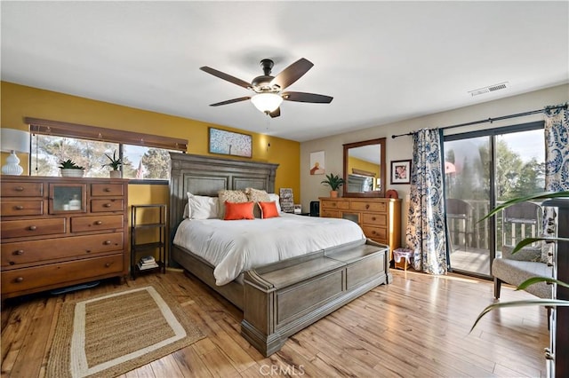 30451 San Pasqual Rd, Temecula, CA 92591 - bedroom featuring access to outside, light wood-type flooring, and a ceiling fan