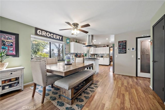 30451 San Pasqual Rd, Temecula, CA 92591 - dining space featuring ceiling fan, light wood finished floors, baseboards, and recessed lighting