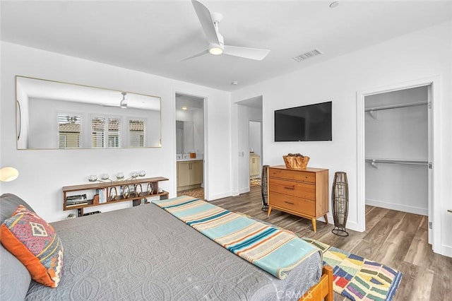 1632 Doheny Way, Dana Point, CA 92629 - bedroom with wood finished floors, baseboards, a ceiling fan, a spacious closet, and a closet