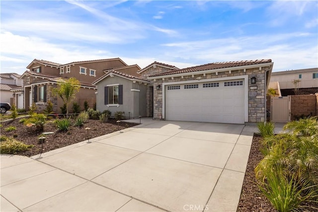 mediterranean / spanish-style home with a garage