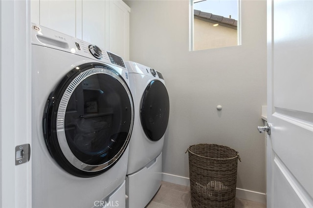 27717 Knoll View Pl, Valencia, CA 91381 - laundry area featuring cabinet space, separate washer and dryer, and baseboards