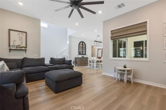 27717 Knoll View Pl, Valencia, CA 91381 - living area featuring ceiling fan, visible vents, stairway, recessed lighting, and light wood-style flooring