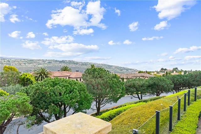 surrounding community featuring fence