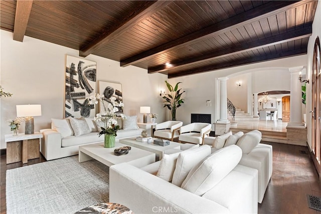 living room with wooden ceiling, decorative columns, arched walkways, and wood finished floors