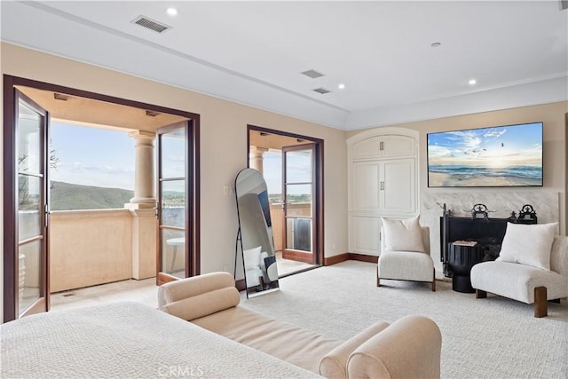 bedroom with recessed lighting, light carpet, visible vents, access to outside, and ornate columns