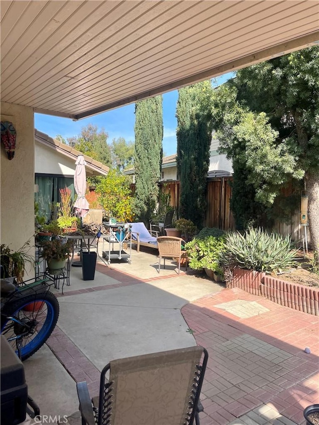 view of patio with fence