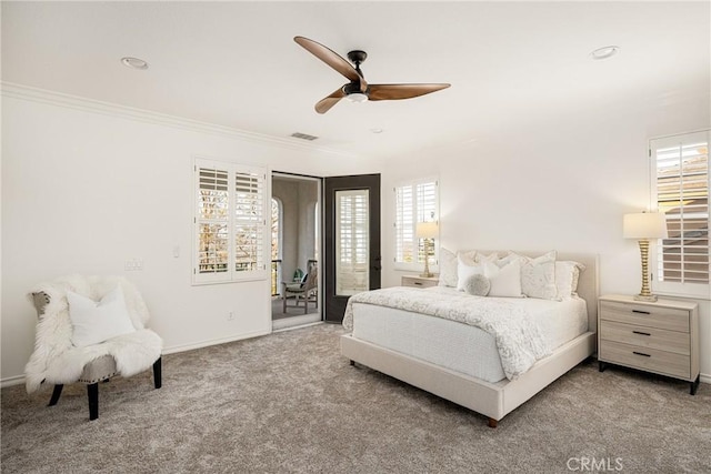 bedroom with carpet floors, visible vents, baseboards, access to exterior, and crown molding