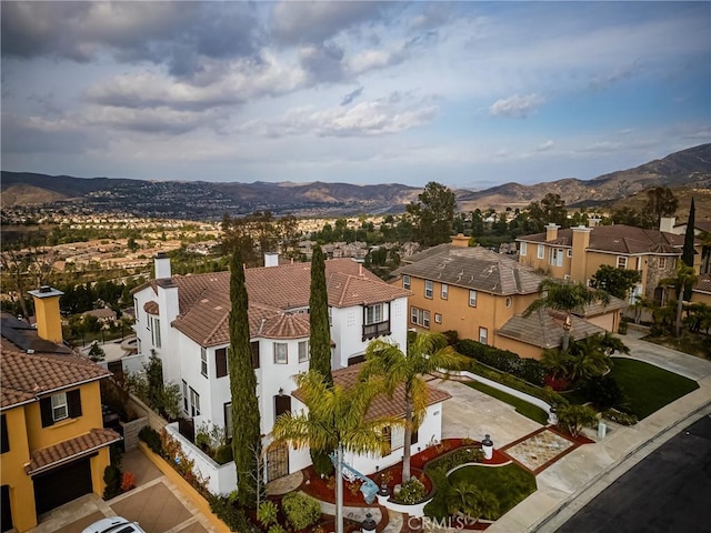 bird's eye view featuring a residential view and a mountain view