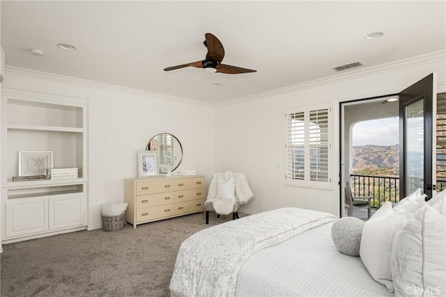 bedroom featuring access to outside, ornamental molding, carpet, and visible vents