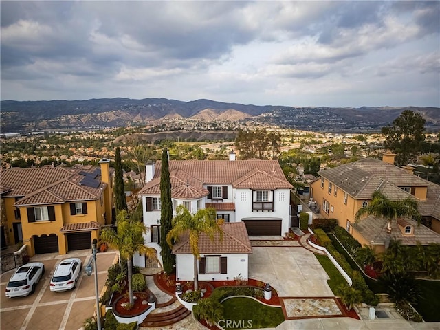 bird's eye view featuring a residential view and a mountain view