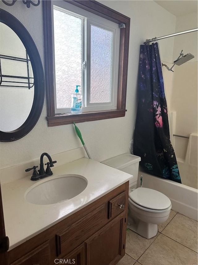 full bathroom featuring tile patterned floors, shower / bathtub combination with curtain, vanity, and toilet