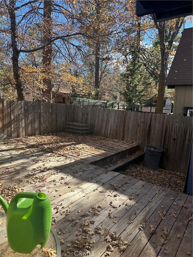 view of yard with a wooden deck