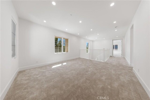 122 Appian Blvd, Irvine, CA 92602 - empty room featuring baseboards, light carpet, and recessed lighting