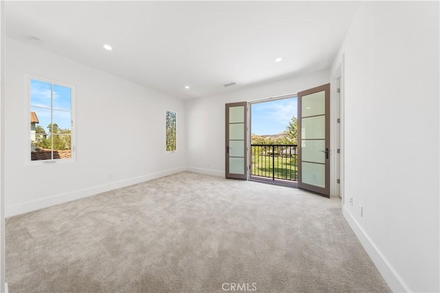 122 Appian Blvd, Irvine, CA 92602 - spare room with recessed lighting, baseboards, and light colored carpet