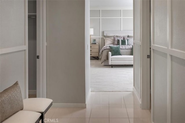 bedroom featuring light tile patterned floors