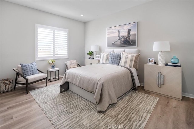 bedroom with light wood-type flooring