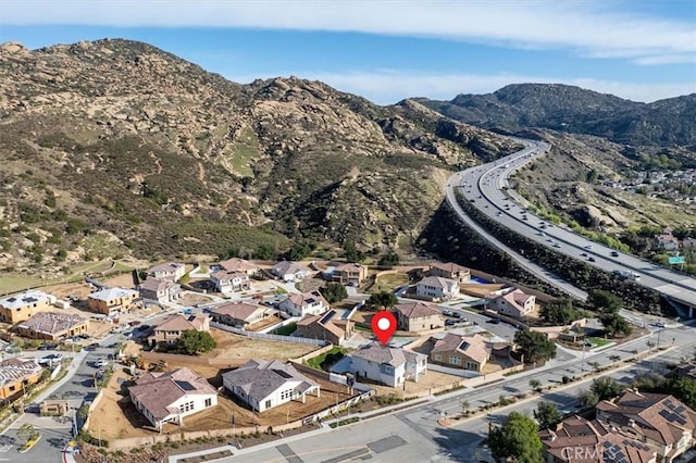 drone / aerial view featuring a mountain view